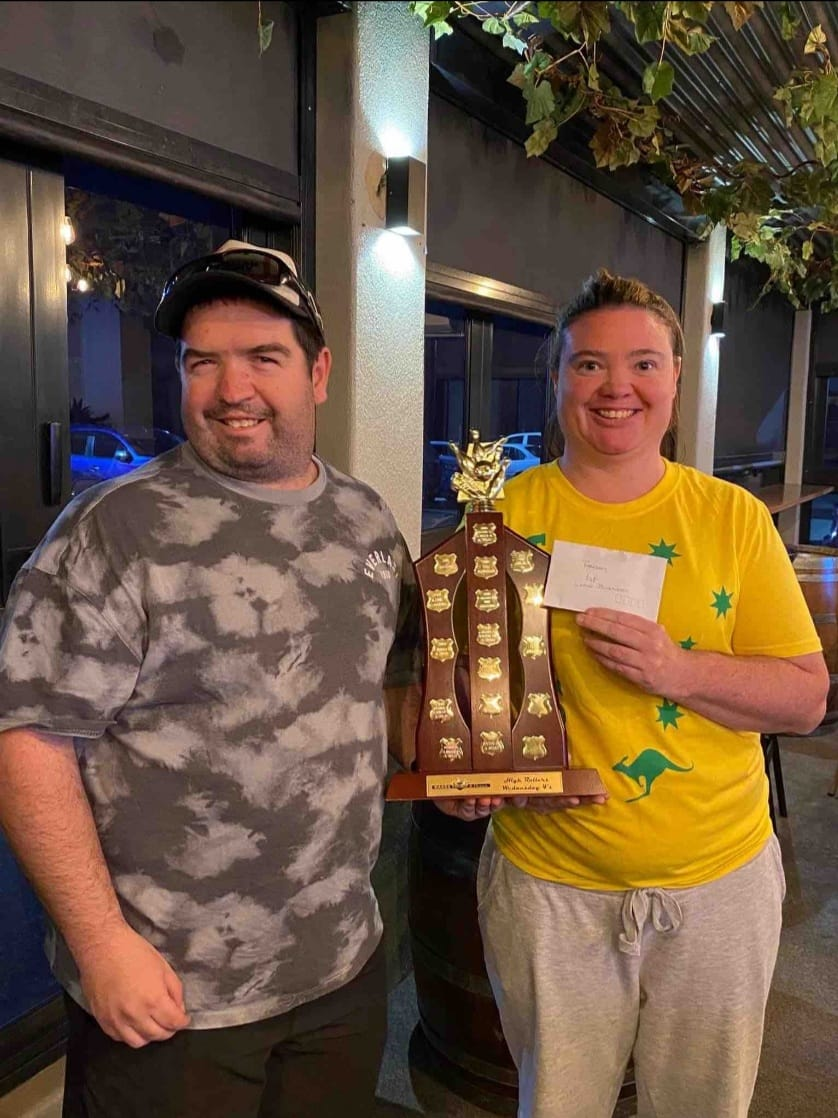 Crew with a trophy at bowling